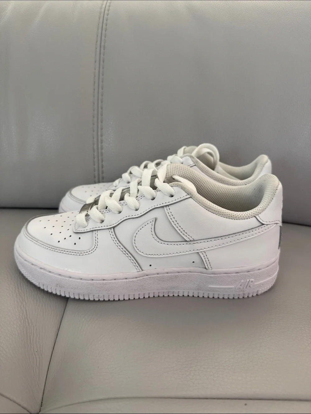 Nike Kids White Leather Sneakers with Subtle Silver Accents